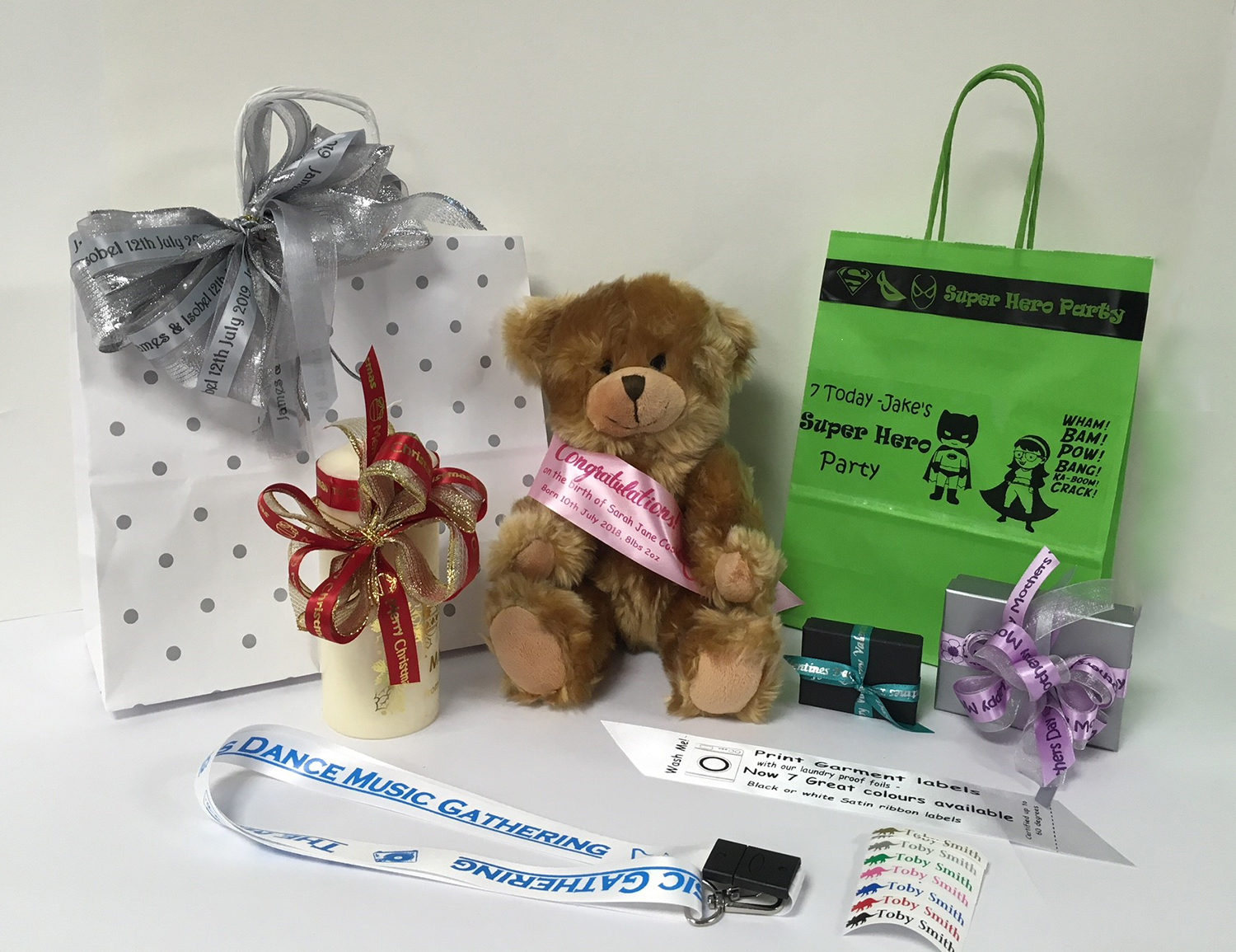 Sample Pack, comprises: Teddy with printed sash, Christmas candle, 2 x boxes - Mother’s day and valentines, 2 x bags – wedding and themed party bag, lanyard and iron on.